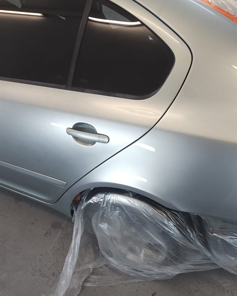 Side panels masked and prepared for paint