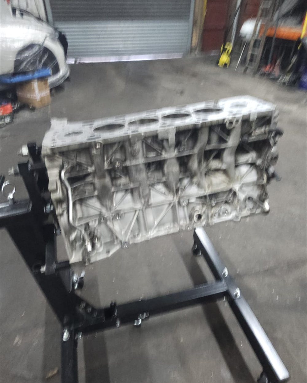 A stripped cylinder head ready for rebuilding