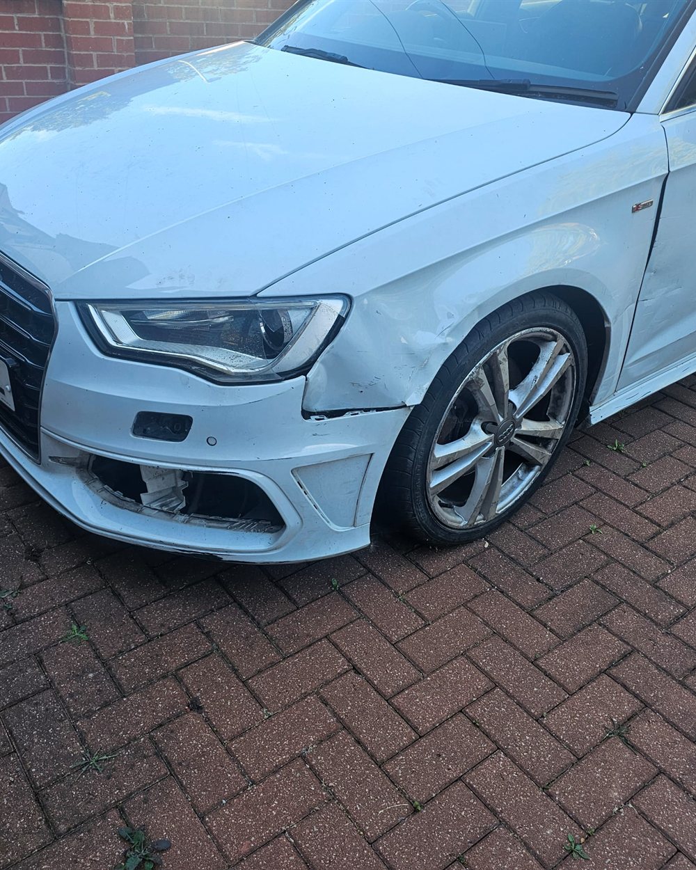 A repaired car back outside and ready to go